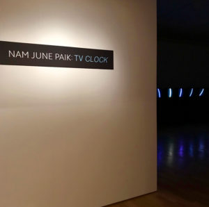 Example of vinyl signage design for the Nam June Paik: TV Clock exhibition at the SBMA